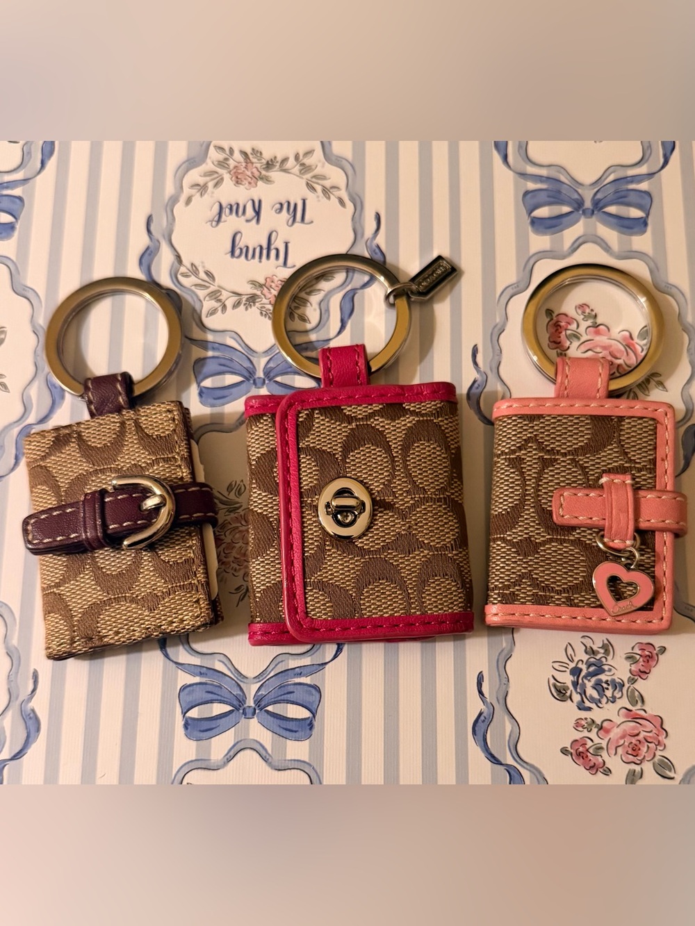 Collectors Lot Coach mini photo book purse charm/key chain-pink,fuschia,& brown.